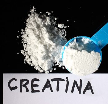 Creatine powder and a small spoon